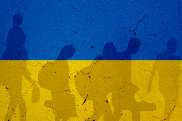 Bild vergrößern: Ukraine,Flag,On,Wall,And,Refugee,Shadows.,Ukraine,War,Concept.